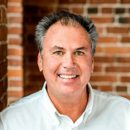 A headshot of David Petropulos, a member of the Millyard Bank Board of Directors.