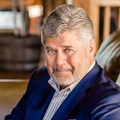 A headshot of John E. Tulley, a member of the Millyard Bank Board of Directors.