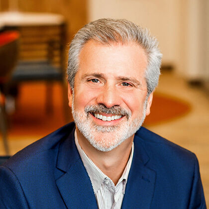 A headshot of Bob E. Friedburg, a member of the Millyard Bank Board of Directors.